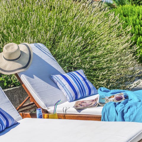 Let the hours melt away on the poolside loungers, armed with a good book