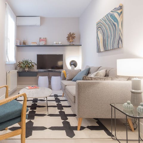 Stretch out in the living room after an action-packed day of exploring Madrid