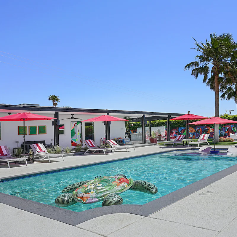 Lounge by the pool, cocktail in hand