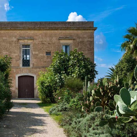 Walk up the verdant path to the nineteenth century home