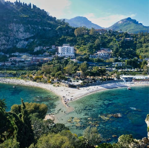 Explore the The Pearl of the Ionian Sea, Isola Bella, a twenty-minute drive away