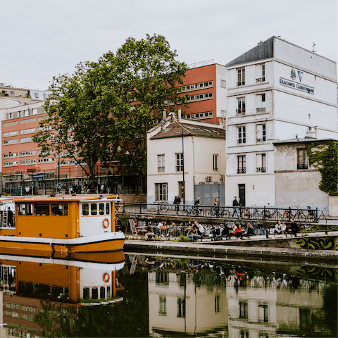 Mingle with the cool cats down at Canal Saint Martin – just a short walk away