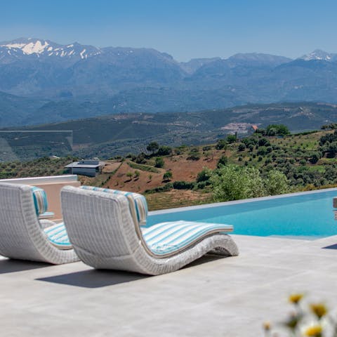 Lounge by the glistening pool or take a refreshing dip, all the while surrounded by those spectacular views
