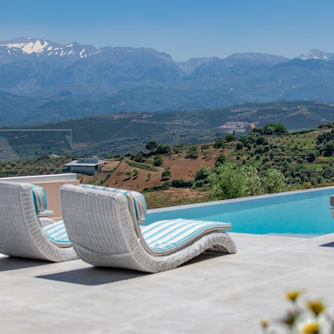 Lounge by the glistening pool or take a refreshing dip, all the while surrounded by those spectacular views