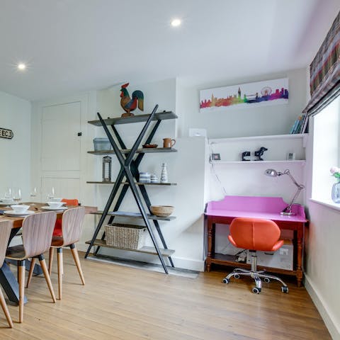 Get a spot of work done at the funky pink desk