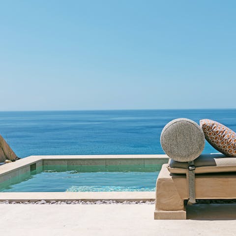 Cool off with a dip in the private swimming pool overlooking the sparkling seascape
