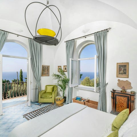 Wake up to sea views in the breezy main bedroom