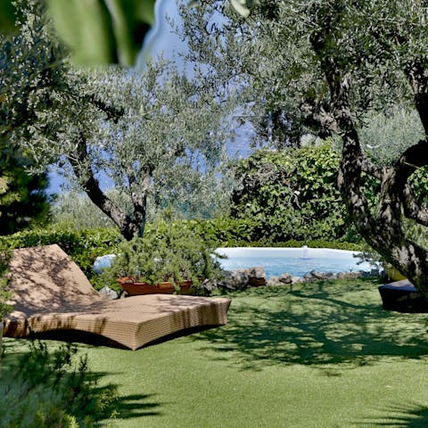 Spend a sunny afternoon relaxing by the private pool