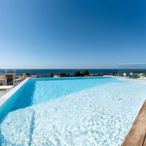 Cool off in the heat with a swim in the communal rooftop pool