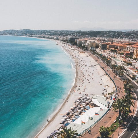 Take a day trip to Nice and sprawl out on the sandy beach