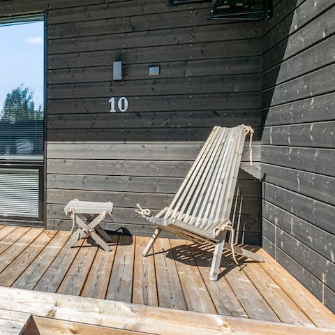 Relax with a book on the home's terrace