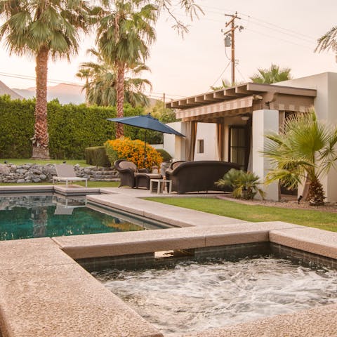 Unwind and sip cocktails in the hot tub