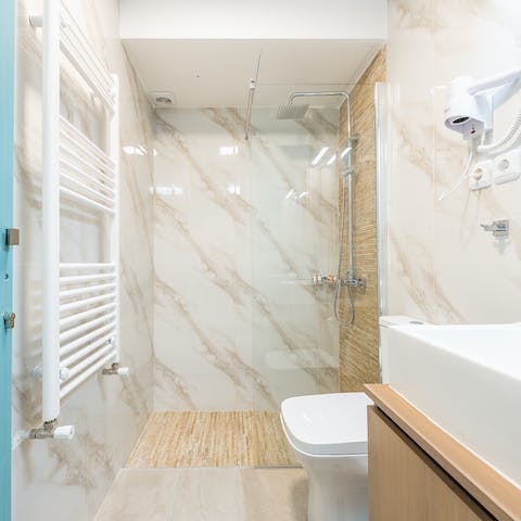 Kickstart your mornings with a wash in the marble en-suite bathroom