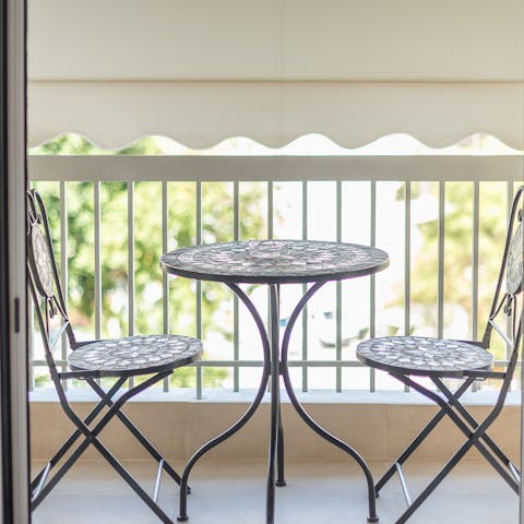 Enjoy wine and olives on your private balcony