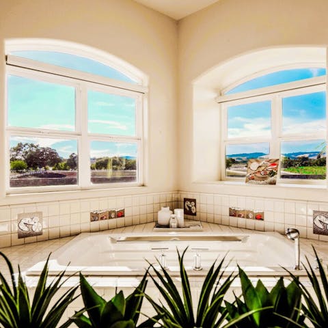 Enjoy a long soak in the sunken bathtub