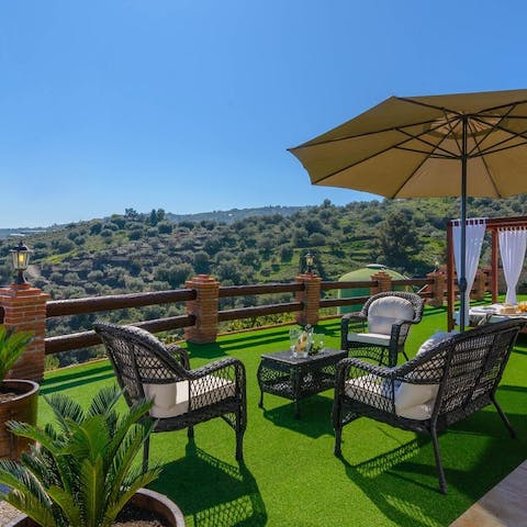 Sip a sundowner while taking in the awe-inspiring views of Torrox's hills