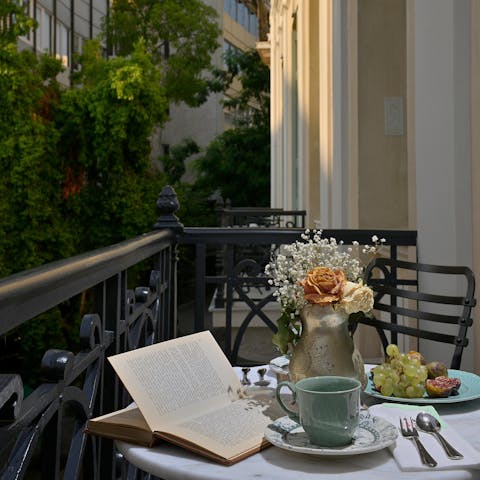 Enjoy an alfresco breakfast of fruits and Greek yoghurt on the private balcony