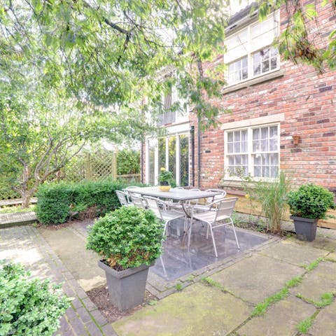 Dine outside under the shade of the old cherry tree