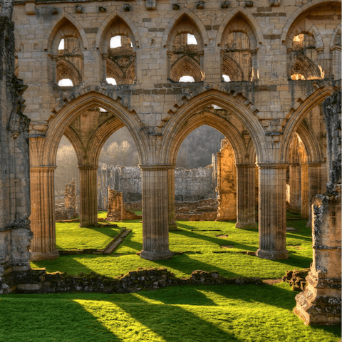 Drive five-minutes to the beguiling ruins of Rievaulx Abbey