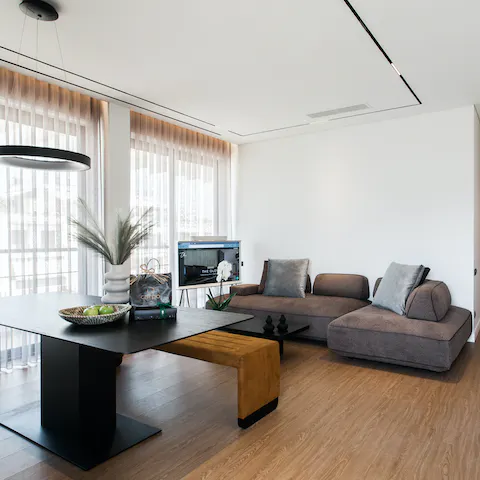Appreciate the stylish contemporary design of your penthouse apartment