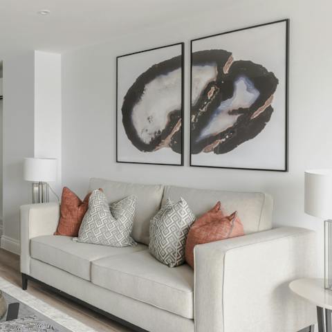 Admire the striking contemporary art in the living space