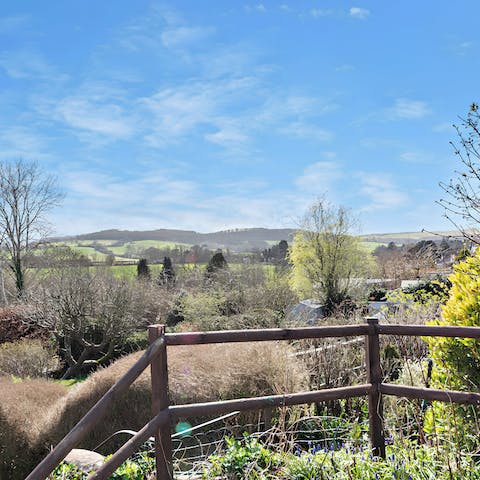 Admire rolling countryside views from the garden