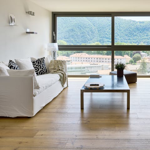 Relax on the sofa while admiring the mountain views