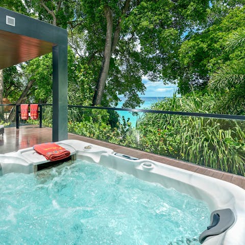 Sit back and relax in the hot tub with a glass of something bubbly in hand