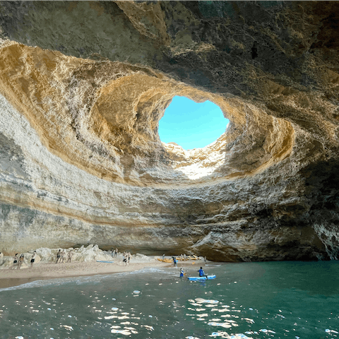 Visit Carvoeiro with its stunning coastline and dramatic natural scenery