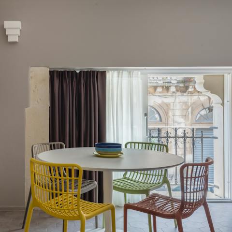 Dine with the balcony doors open for that alfresco feeling