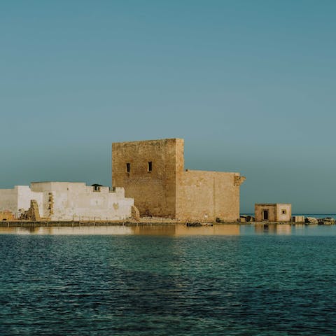 Travel 45km south to the beachside stone ruins of Tonnara de Vendicari
