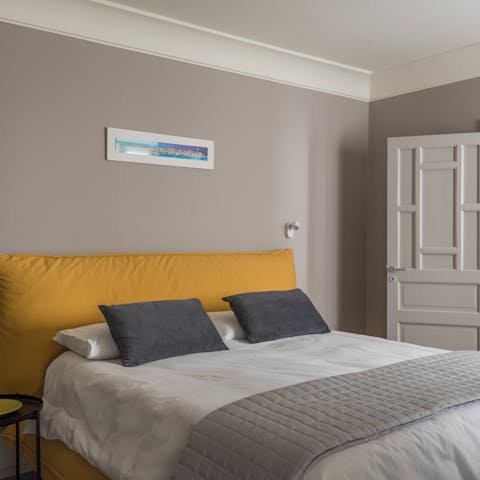 Sleep soundly in the comfortable bed after a day spent exploring Syracuse