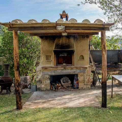 Get a fire roaring in the outdoor oven and grill for a rustic feast