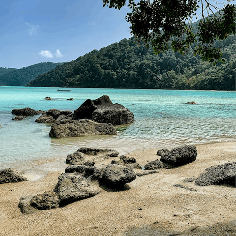 Walk just eight minutes to the crystal clear waters of Patong Beach