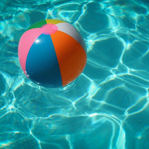 Splash around in the private swimming pool to escape the balmy heat