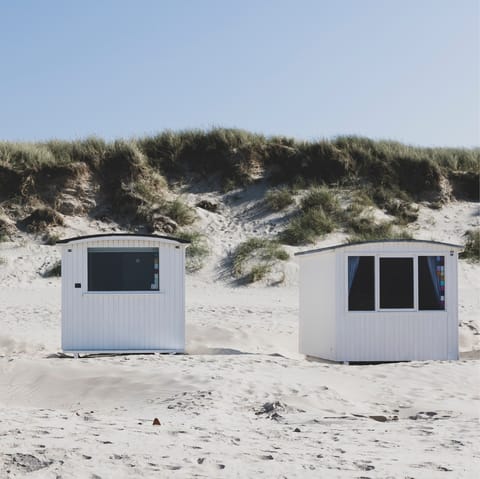 Stroll along the light sands of  Høve beach, which is less than a ten-minute drive away