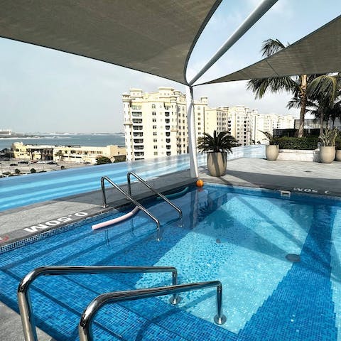 Cool off from the Dubai heat in the communal rooftop swimming pools