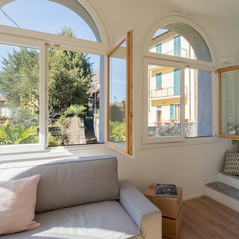Open up the arched windows and let a cooling breeze into the apartment