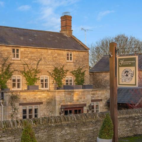 Stop for a well-deserved gin and tonic in the Feathered Nest, a two-minute walk away