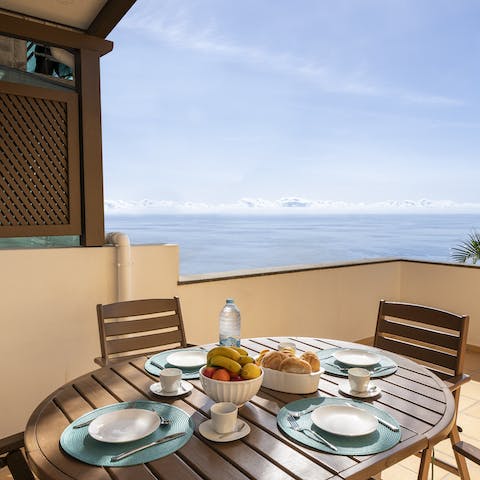 Tuck into an alfresco breakfast with sea views on the terrace