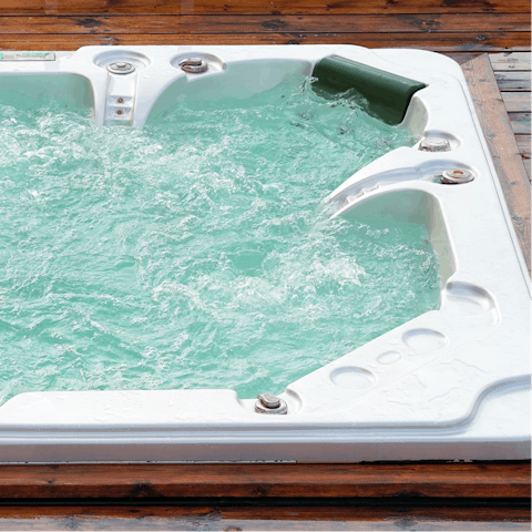 Take the relaxing to the next level with a soak in the private hot tub