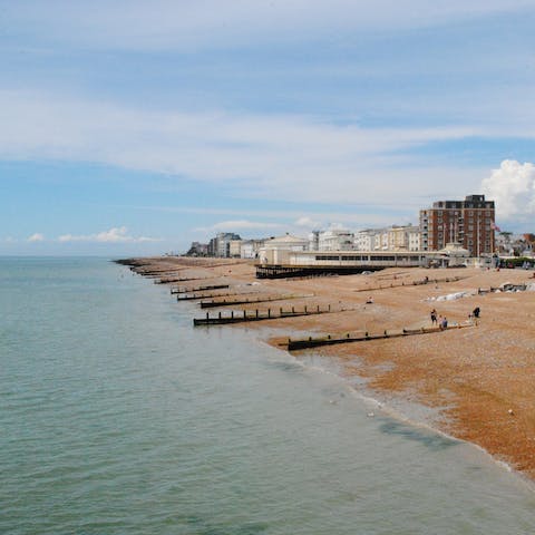 Drive fifteen minutes to Worthing and spend the day by the seaside