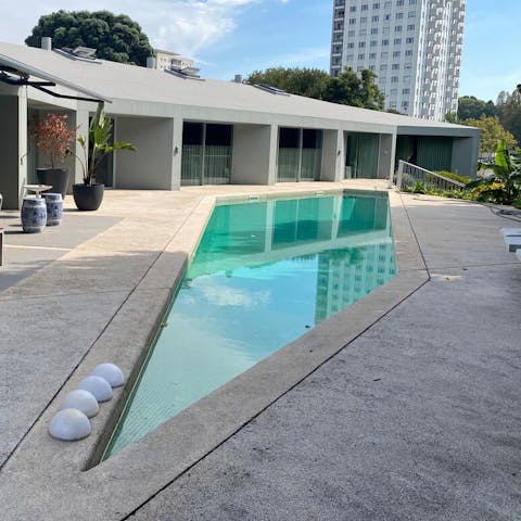 Swim in style in the angular outdoor pool 