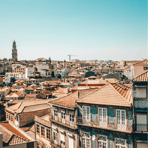 Wander the charming riverside streets of Porto, a 15-minute drive away 