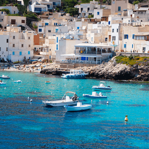 Explore the charming whitewashed city of Trapani – you're a twenty-five minute drive away