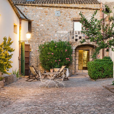 Chat to the other guests of these beautiful homes in your enchanting shared courtyard