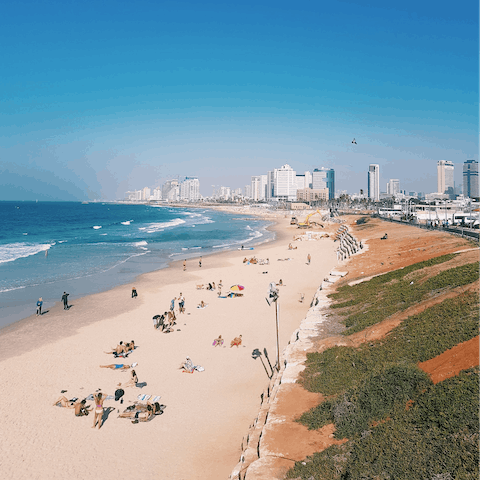 Discover Tel Aviv's long, sandy stretch of beaches – Metzitzim Beach is just a short walk away