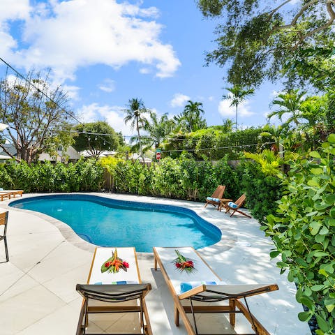 Soak up the Floridian sun from in or beside the private pool