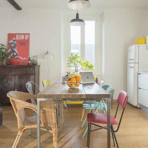 Gather together for meals around the industrial-style dining table