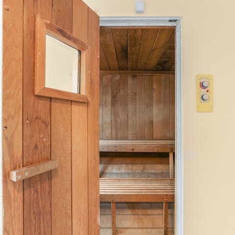 Unwind and soothe your muscles in the dry sauna